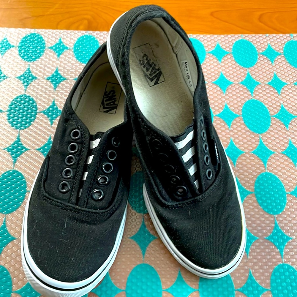 Vans slip on shoe. Woman size 6/  Men 4.5. EUC.